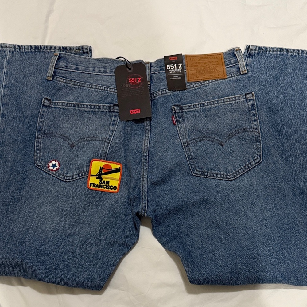 Stylish Blue Wide Leg Jeans with Fun Patches.Size 33x30 - Picture 6 of 11